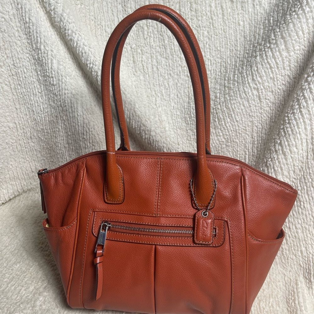 Clarks leather orange Medium shoulder Bag with gold tone hardwares.